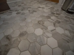 Kechele Bathroom: Hexagon marble-look floor tile